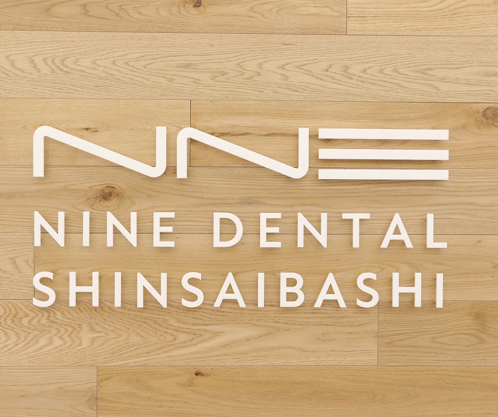 NINE DENTAL 心斎橋PARCOのロゴ